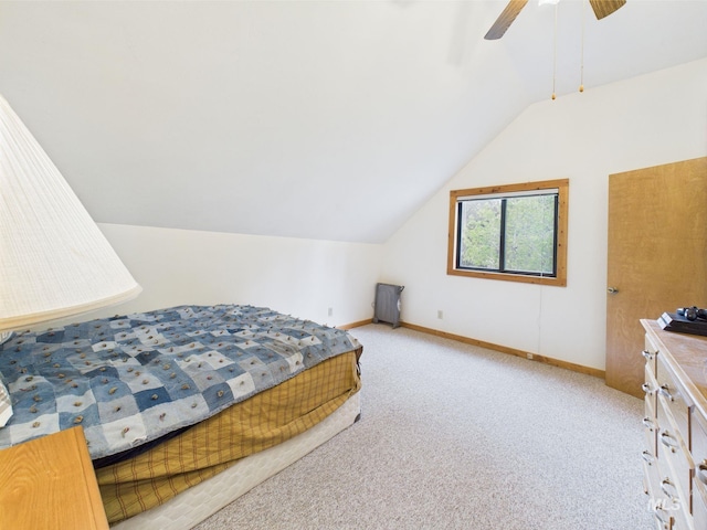 19 Hack Ln, Idaho City, ID 83631 - bedroom featuring baseboards, light carpet, vaulted ceiling, and a ceiling fan