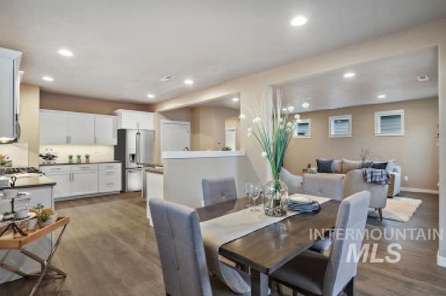 dining room with light hardwood / wood-style floors