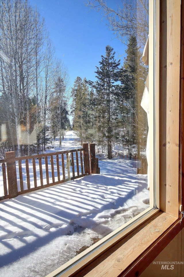 view of snow covered deck