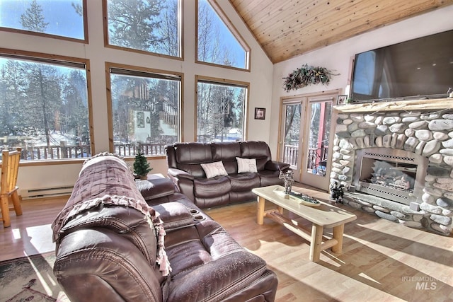 living room with high vaulted ceiling, a fireplace, a baseboard heating unit, wooden ceiling, and light hardwood / wood-style flooring