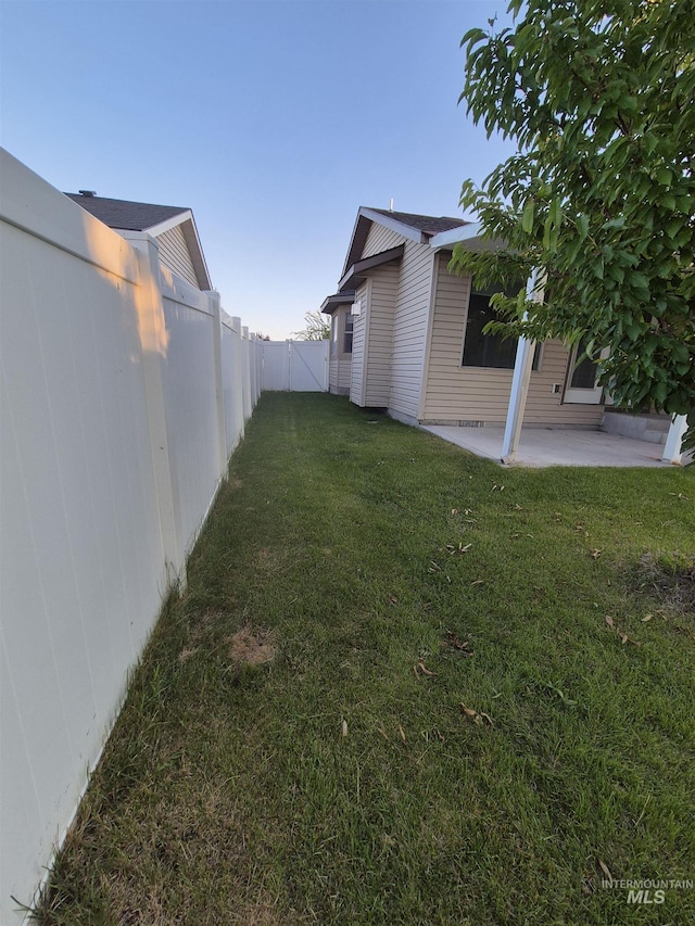 400 Pheasant Rd W, Twin Falls, ID 83301 - fenced backyard featuring a patio area