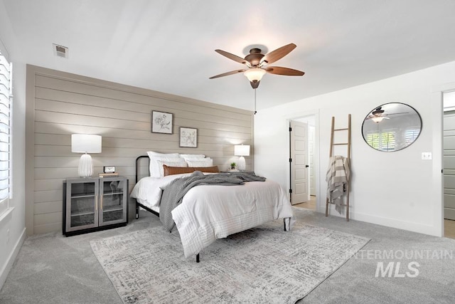 bedroom featuring carpet, ceiling fan, and baseboards
