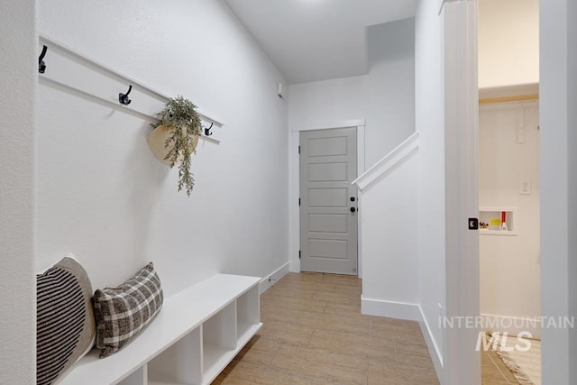 mudroom featuring baseboards