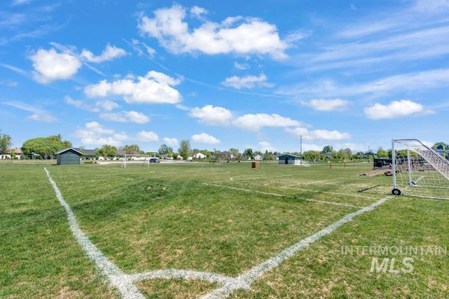 view of yard with a sport area