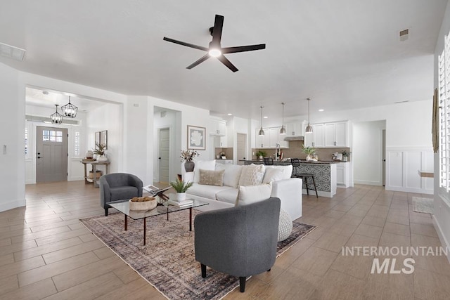 living room with ceiling fan