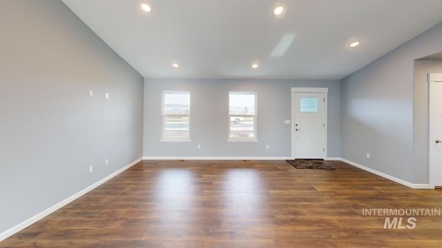 interior space with dark hardwood / wood-style flooring