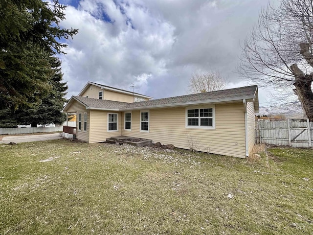 263 Whitman St, Albion, ID 83311 - back of house featuring fence and a yard