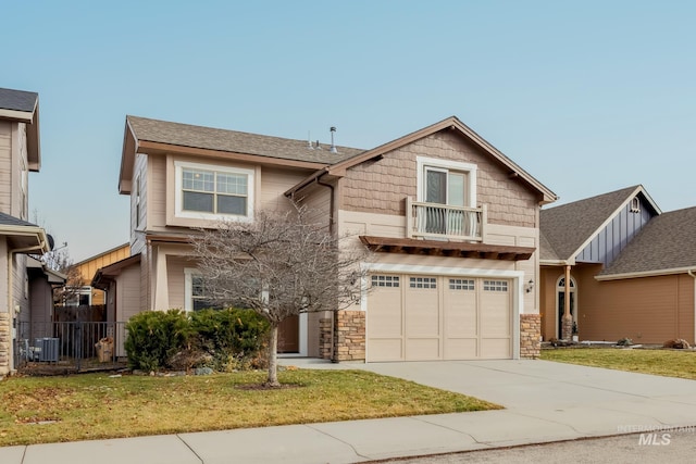 view of front of home with central AC unit, a garage, driveway, stone siding, and a front lawn