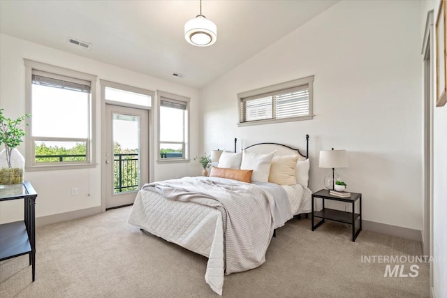 2381 E Warm Spgs, Boise, ID 83712 - bedroom featuring access to outside, light carpet, vaulted ceiling, and baseboards