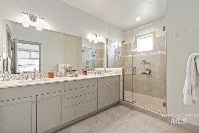 2381 E Warm Spgs, Boise, ID 83712 - bathroom with double vanity and a stall shower