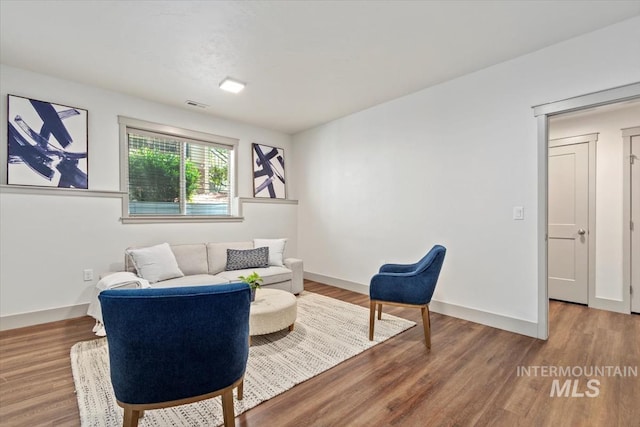 2381 E Warm Spgs, Boise, ID 83712 - sitting room with wood finished floors and baseboards