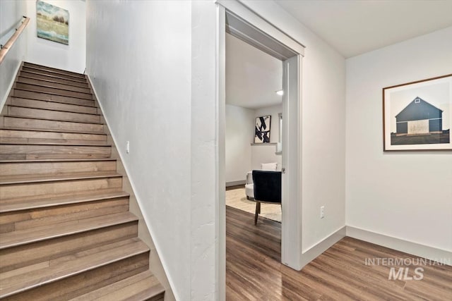 2381 E Warm Spgs, Boise, ID 83712 - stairs featuring wood finished floors and baseboards