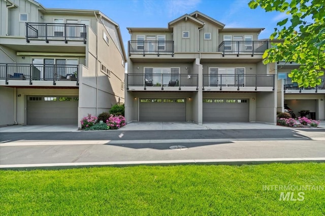 2381 E Warm Spgs, Boise, ID 83712 - view of apartment building / complex featuring a garage