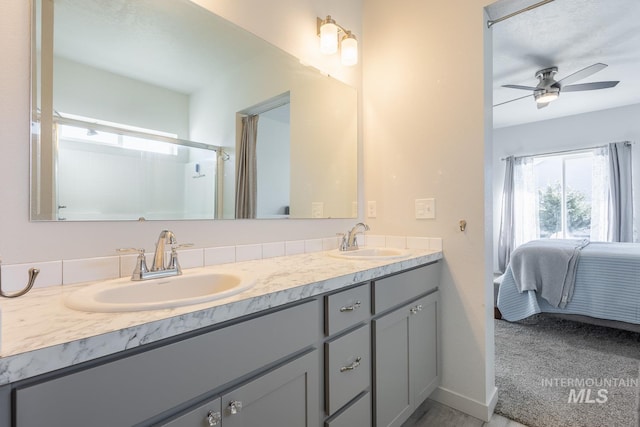 bathroom featuring vanity and ceiling fan