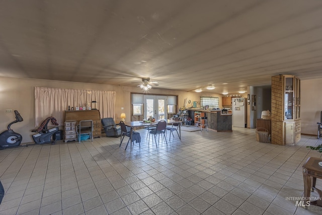 702 N D St, Grangeville, ID 83530 - dining area featuring tile patterned floors and a ceiling fan