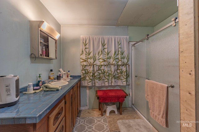 bathroom featuring vanity and walk in shower