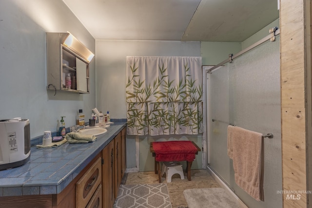 702 N D St, Grangeville, ID 83530 - bathroom featuring vanity and a stall shower