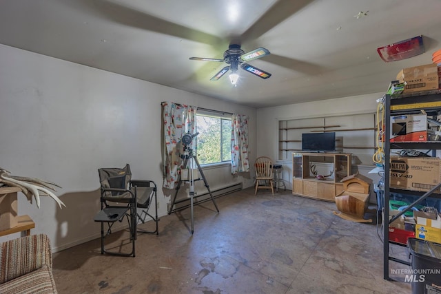 interior space featuring baseboard heating, ceiling fan, and concrete floors