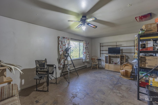 702 N D St, Grangeville, ID 83530 - interior space featuring a baseboard radiator, ceiling fan, and unfinished concrete floors