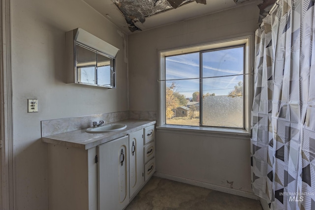 702 N D St, Grangeville, ID 83530 - bathroom featuring vanity and healthy amount of natural light