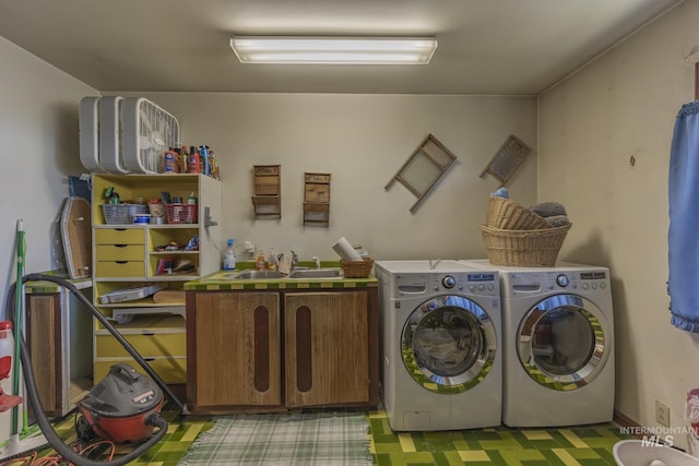 702 N D St, Grangeville, ID 83530 - laundry room with cabinet space and washing machine and dryer