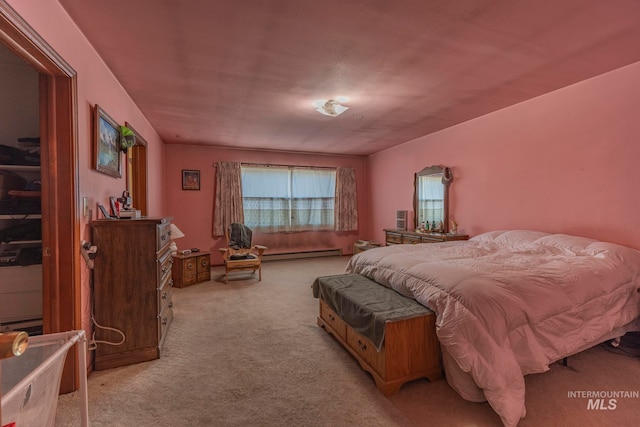 bedroom featuring light colored carpet and a baseboard radiator