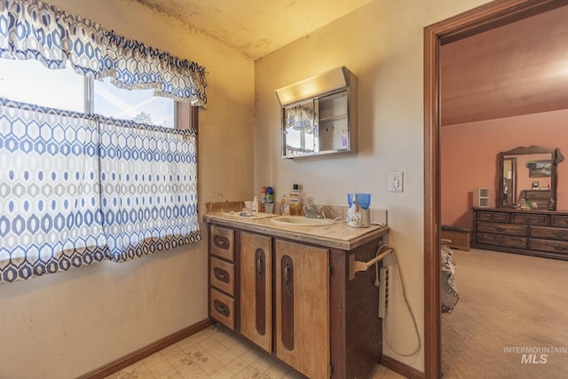 702 N D St, Grangeville, ID 83530 - bathroom featuring vanity and baseboards