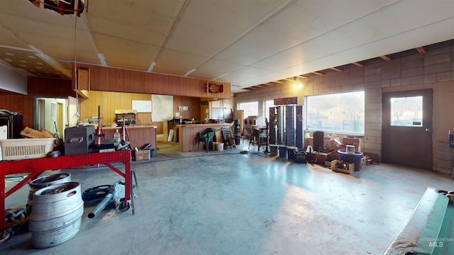702 N D St, Grangeville, ID 83530 - garage with wooden walls and a workshop area