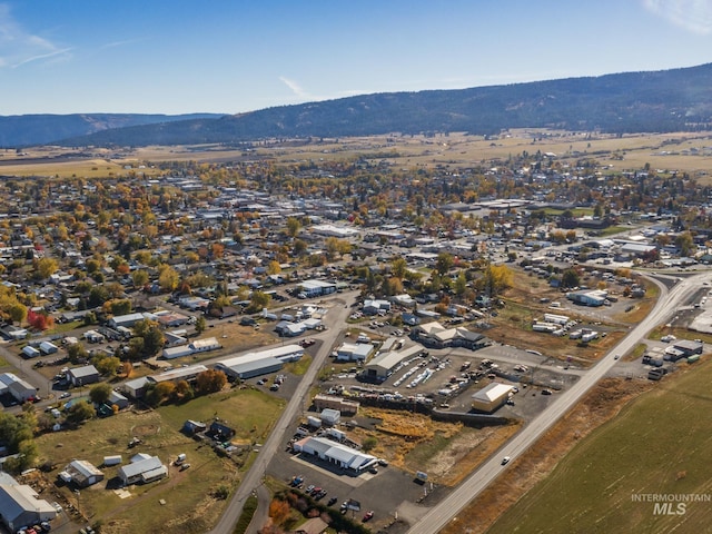 702 N D St, Grangeville, ID 83530 - aerial overview of property's location with a mountainous background