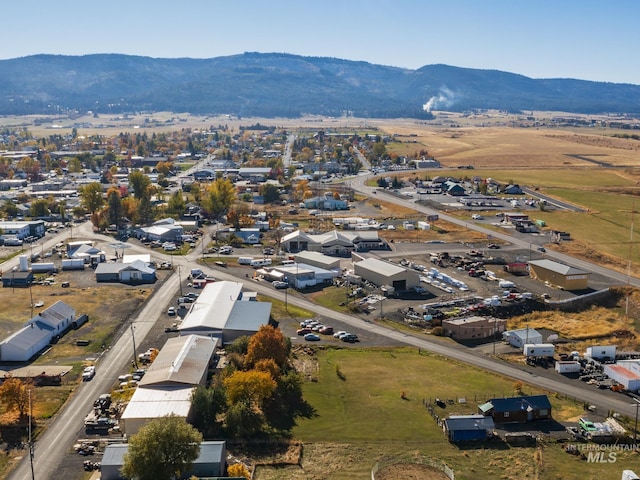 702 N D St, Grangeville, ID 83530 - aerial view of property and surrounding area with a mountainous background