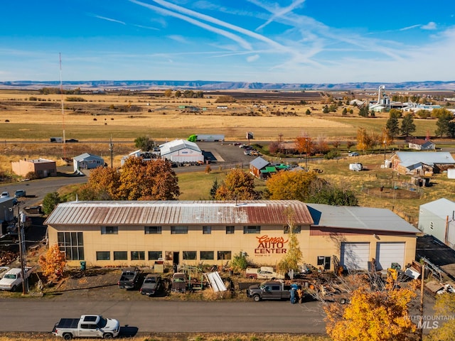 drone / aerial view featuring a mountain view