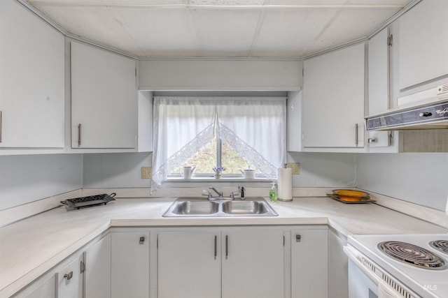kitchen with white electric range, light countertops, white cabinetry, under cabinet range hood, and a sink