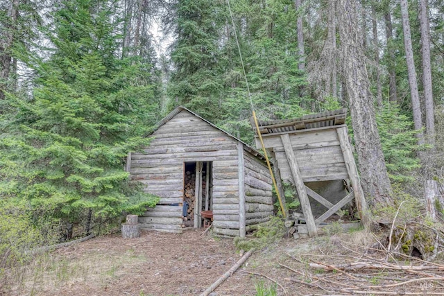 view of outdoor structure with an outdoor structure and a wooded view