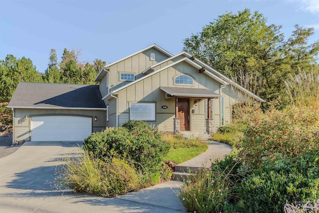 view of front facade with a garage and a porch