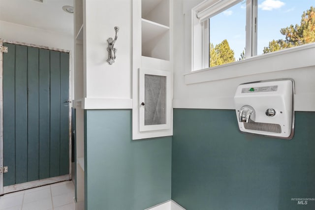 interior details featuring tile patterned flooring