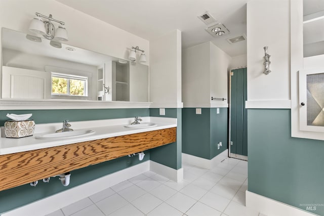 bathroom featuring vanity and tile patterned floors