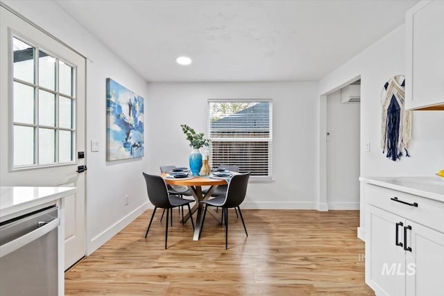 916 N 32nd St, Boise, ID 83702 - dining area featuring light wood-style flooring, baseboards, recessed lighting, and a wall mounted AC