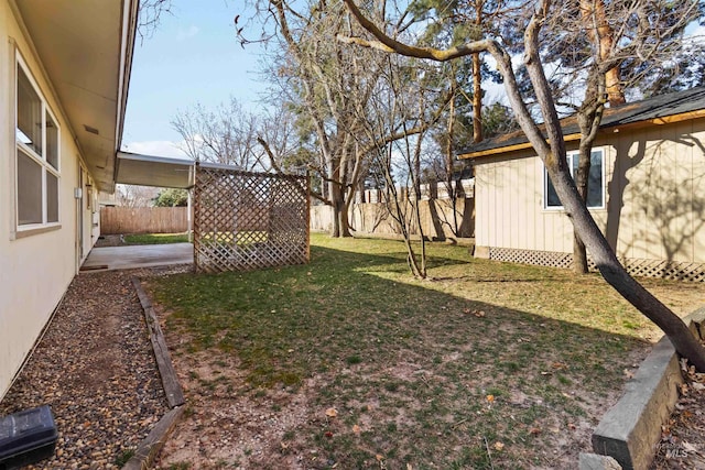 view of yard featuring a patio and a fenced backyard