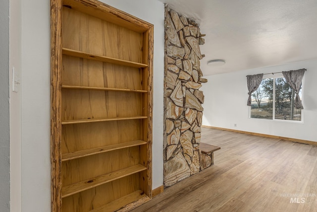 details with a fireplace and hardwood / wood-style floors