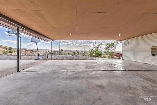 view of patio / terrace featuring a mountain view