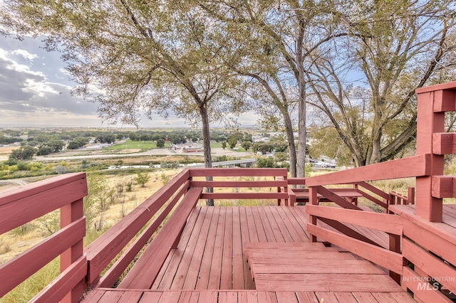 wooden terrace with a rural view