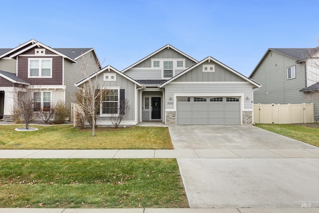 2935 NW 8th Ave, Meridian, ID 83646 - craftsman-style house featuring board and batten siding, a garage, concrete driveway, and stone siding