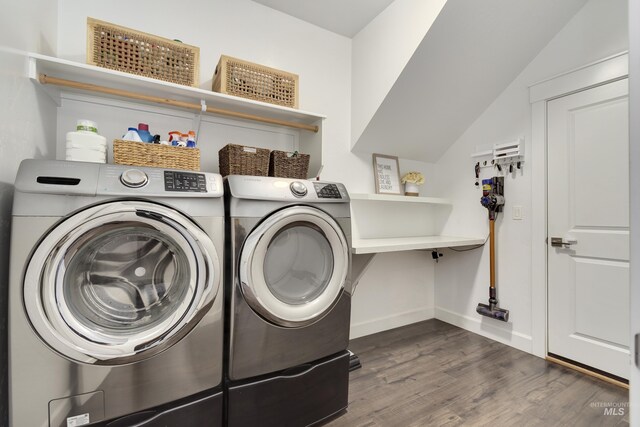 2935 NW 8th Ave, Meridian, ID 83646 - clothes washing area with washing machine and clothes dryer, dark wood-style flooring, and baseboards