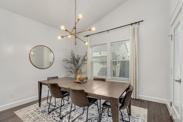2935 NW 8th Ave, Meridian, ID 83646 - dining room featuring a chandelier, vaulted ceiling, dark wood finished floors, and baseboards