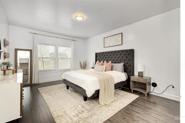 2935 NW 8th Ave, Meridian, ID 83646 - bedroom featuring dark wood-style flooring and baseboards