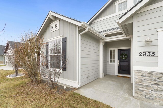2935 NW 8th Ave, Meridian, ID 83646 - view of exterior entry with board and batten siding