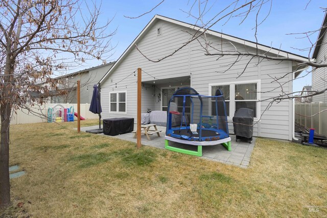 2935 NW 8th Ave, Meridian, ID 83646 - rear view of house featuring a patio area and a trampoline