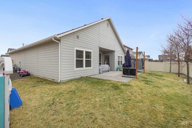 2935 NW 8th Ave, Meridian, ID 83646 - back of house with a patio area