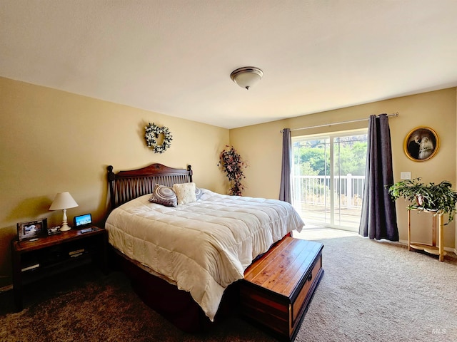 bedroom featuring access to outside and carpet