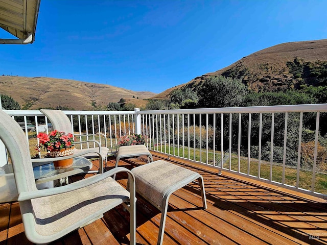 deck with a mountain view